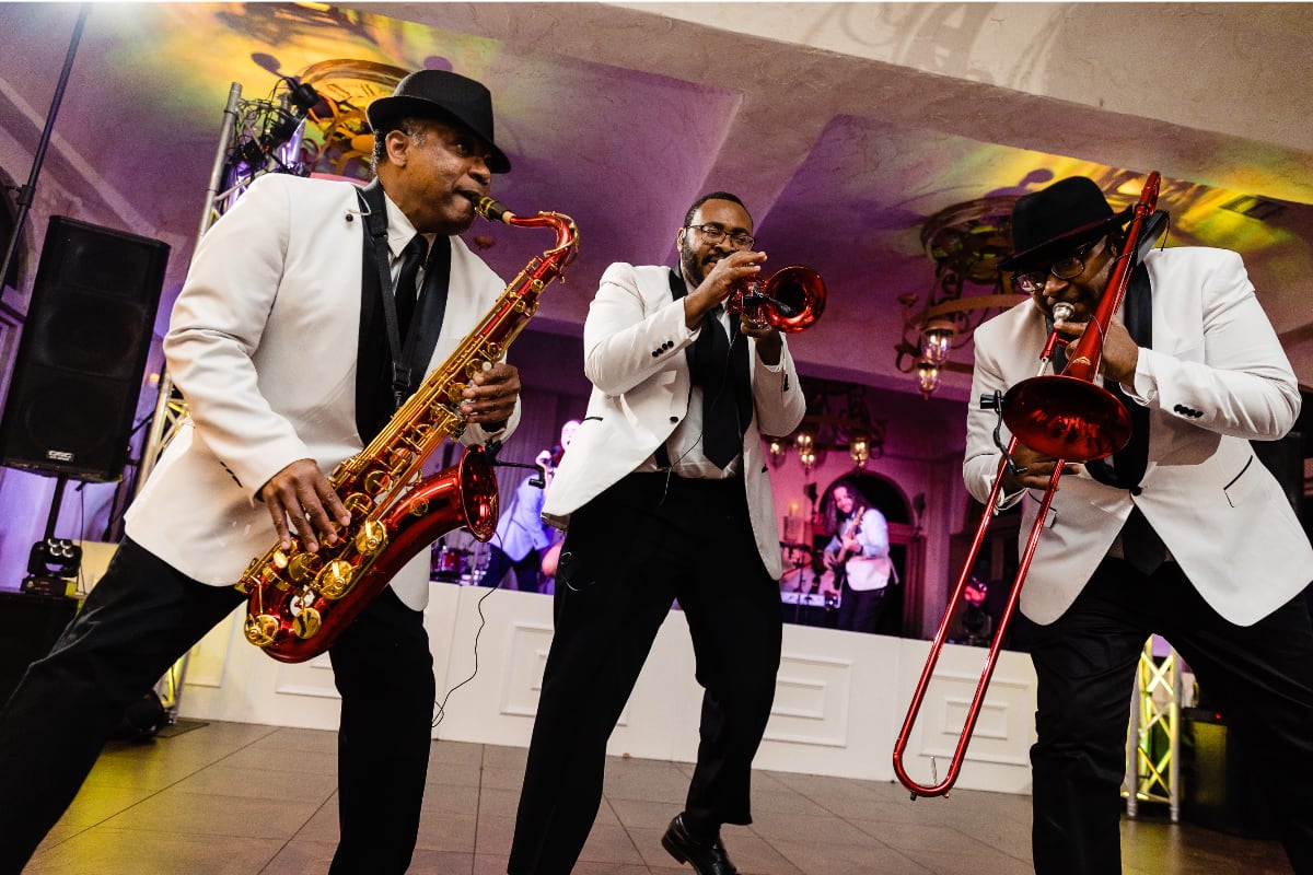 The Plush Brass Section performing